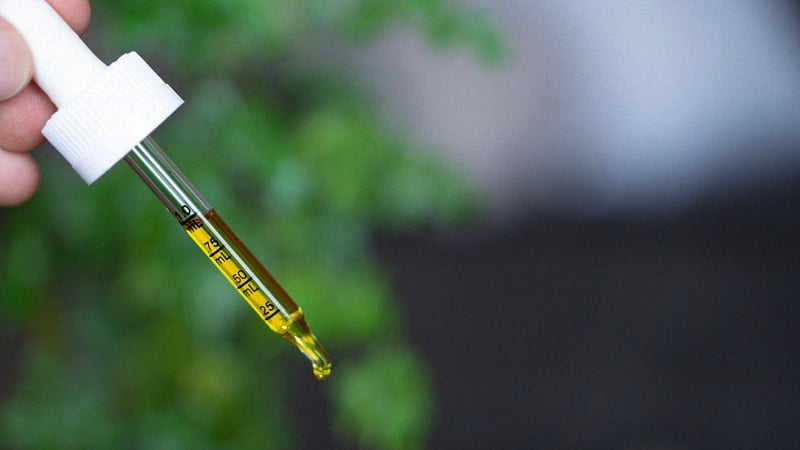 CBD oil dropper with measurements