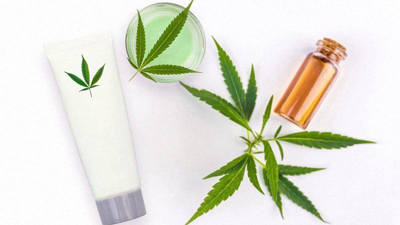 CBD products with hemp leaf in a white background