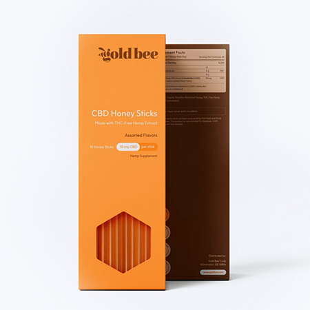 Gold Bee Honey Sticks in White Background