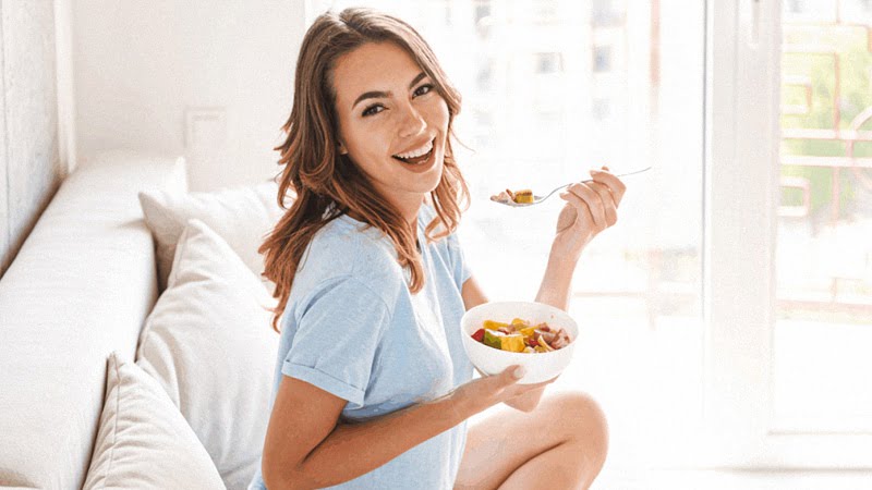 Woman Eating Healthy Meal