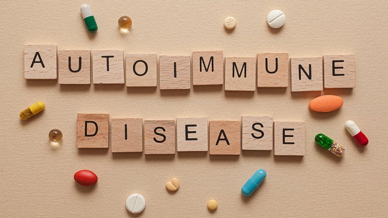Autoimmune Disease Words Surrounded by Pills and Tablets